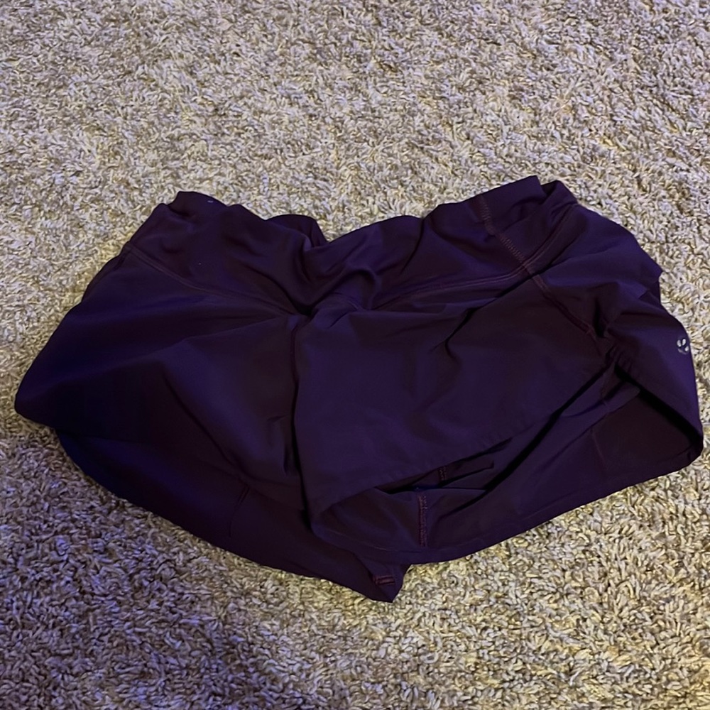 PURPLE LULULEMON SPEED UP SHORTS
